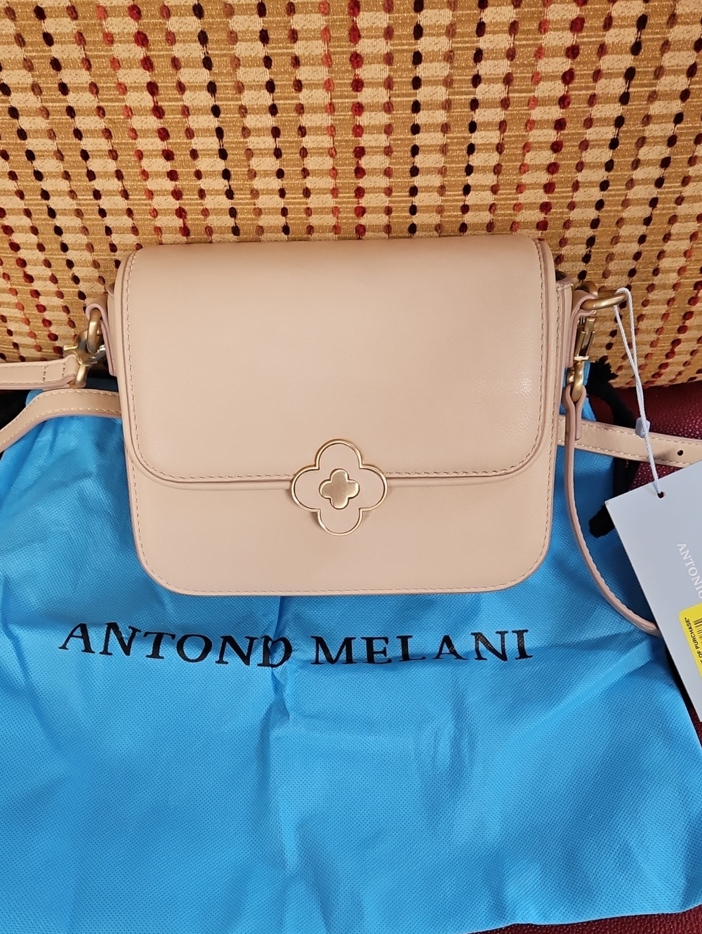 ANTONIO MELANI Blush Tan Leather Crossbody with Gold Clover Accent